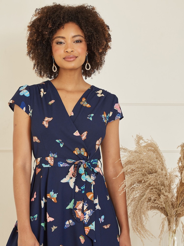 Mela Blue Butterfly Print Dip Hem Midi Wrap Dress - Image 2 of 5