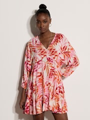 Apricot Pink Tropical Leaf Mini Dress - Image 1 of 4