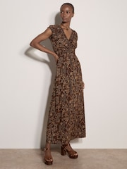 Apricot Brown Batik Floral Smocked Maxi Dress - Image 1 of 4