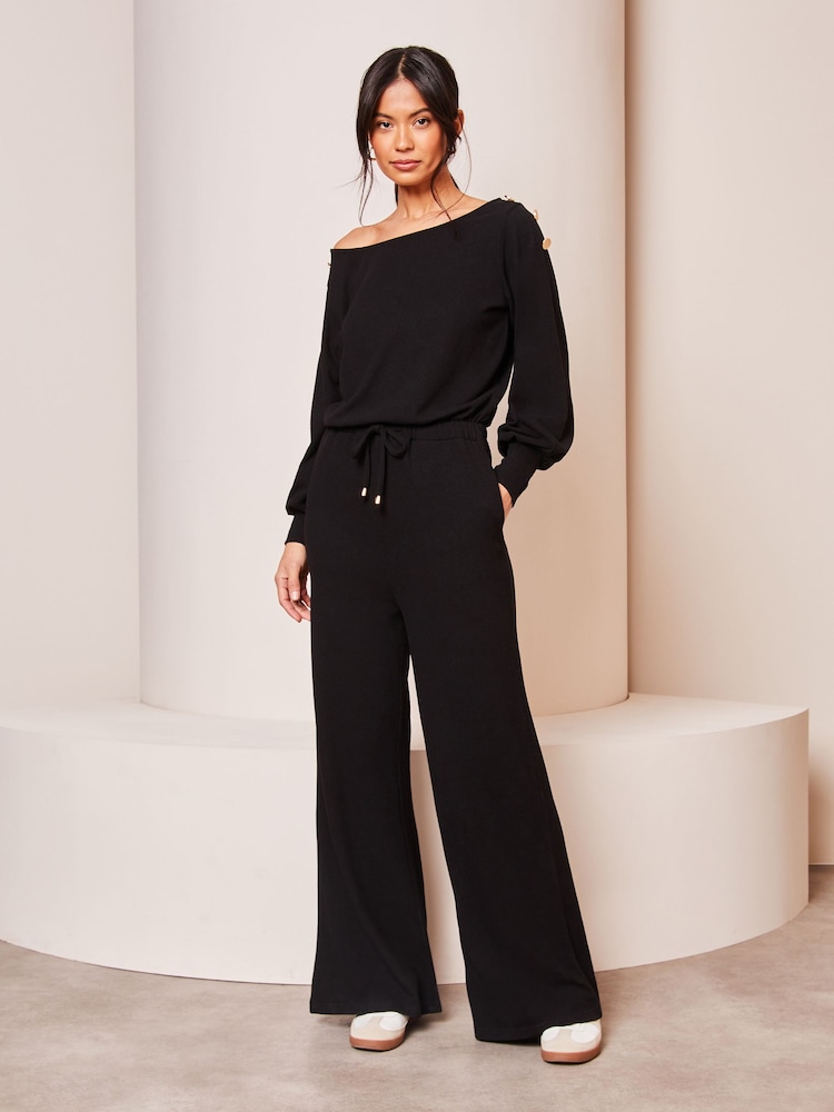 Lipsy Black Petite Cosy Off The Shoulder Long Sleeve Jumpsuit - Image 1 of 4