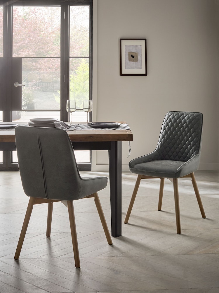 Set of 2 Monza Faux Leather Dark Grey Hamilton Dark Wood Leg Quilted Dining Chairs - Image 1 of 10