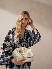 Bone Leather Bow Clutch Bag - Image 4 of 9