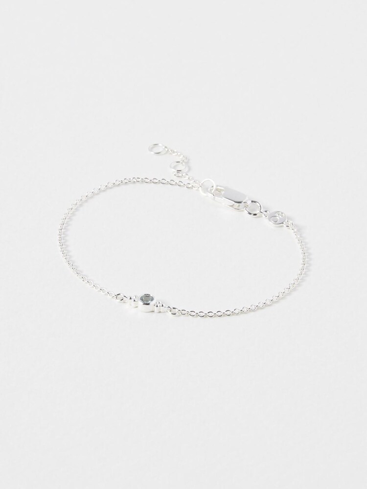 Oliver Bonas Silver Tone Octavia Aquamarine Charm Bracelet - Image 1 of 4 Oliver Bonas Silver Tone Octavia Aquamarine Charm Bracelet - Image 1 of 4