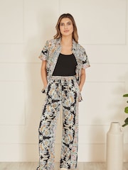 Yumi Black Relaxed Fit Paisley Print Trousers - Image 1 of 4