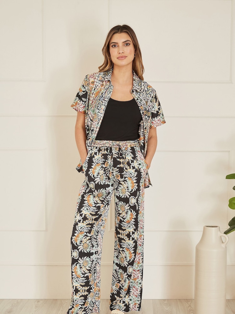 Yumi Black Relaxed Fit Paisley Print Trousers - Image 1 of 4