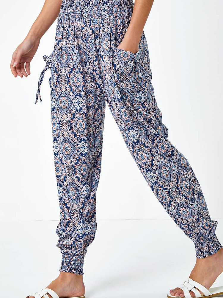Pantalones de harén elásticos con estampado floral de Roman - Imagen 1 de 5 Pantalones de harén elásticos con estampado floral de Roman - Imagen 1 de 5