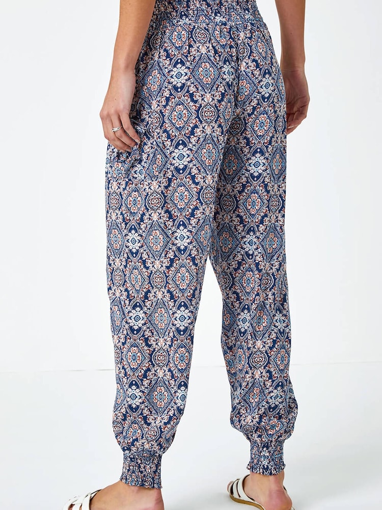Pantalones de harén elásticos con estampado floral de Roman - Imagen 2 de 5 Pantalones de harén elásticos con estampado floral de Roman - Imagen 2 de 5