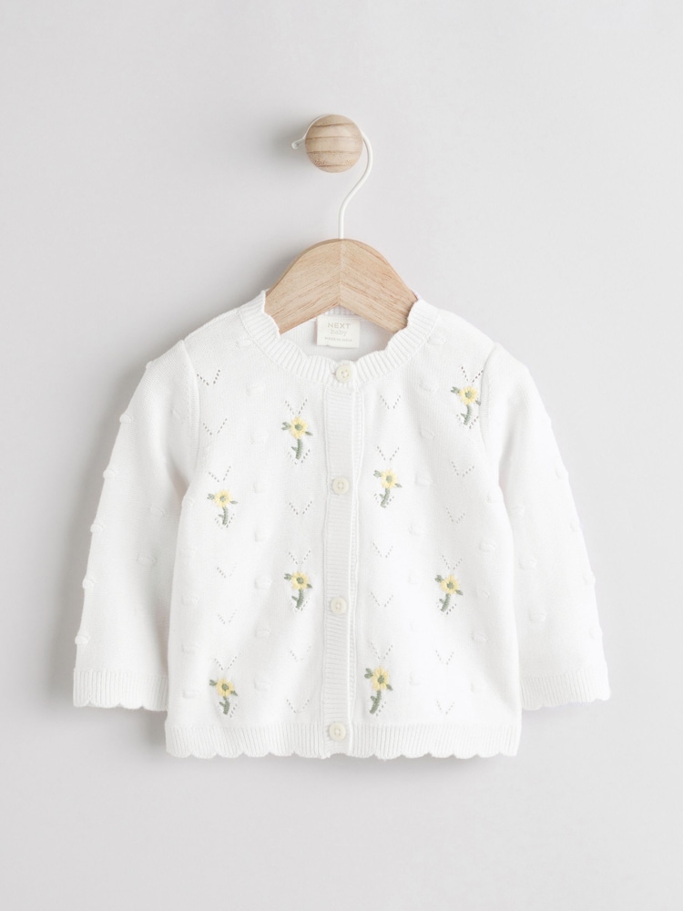 White 100% Cotton Pointelle Knitted Floral Flower Baby Cardigan (0mths-3yrs) - Image 1 of 5