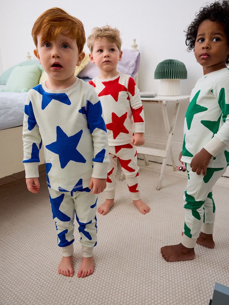 Red/Blue/Green Stars Snuggle 100% Cotton Pyjamas 3 Pack (9mths-12yrs) - Image 1 of 17 Red/Blue/Green Stars Snuggle 100% Cotton Pyjamas 3 Pack (9mths-12yrs) - Image 1 of 17