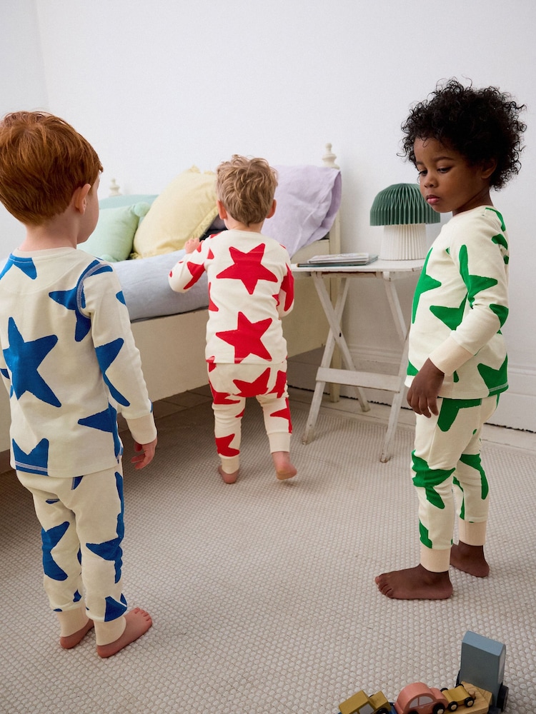 Red/Blue/Green Stars Snuggle 100% Cotton Pyjamas 3 Pack (9mths-12yrs) - Image 2 of 17 Red/Blue/Green Stars Snuggle 100% Cotton Pyjamas 3 Pack (9mths-12yrs) - Image 2 of 17