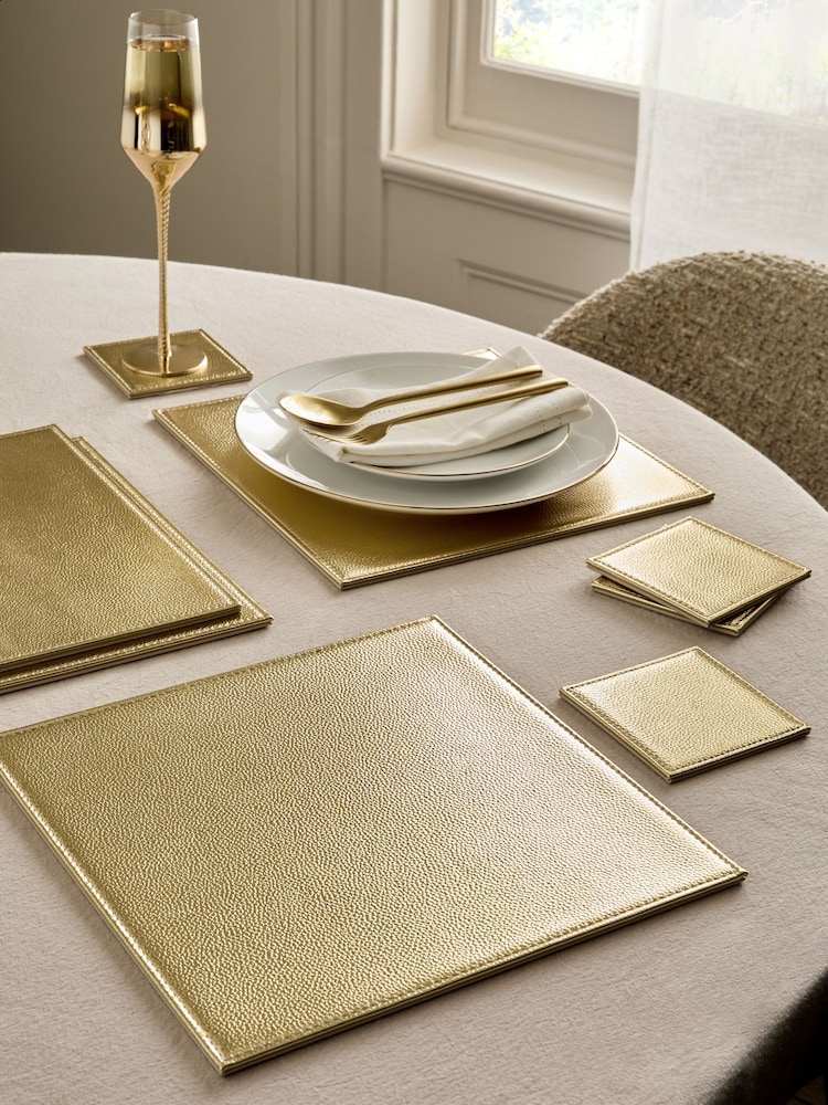Set of 4 Gold Reversible Faux Leather Placemats and Coasters - Image 1 of 3