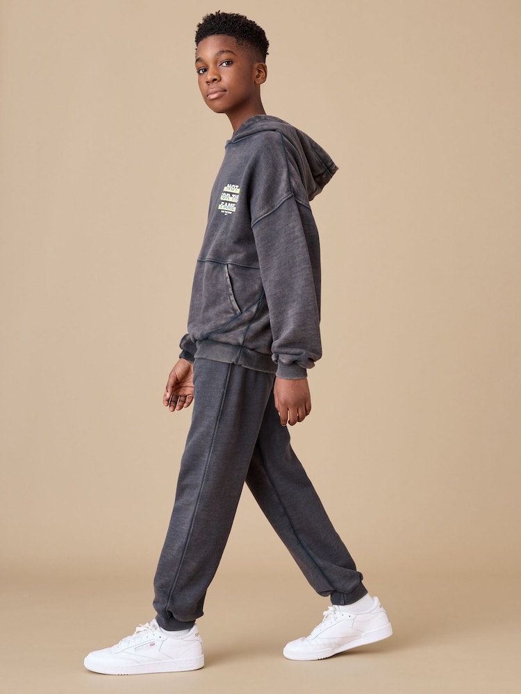 Reebok Boys Washed Logo 100% Cotton Black Joggers - Image 1 of 8