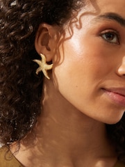 Gold Tone Starfish Statement Stud Earrings Made with Recycled Zinc - Image 1 of 4