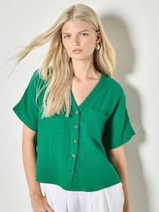 Apricot Green Textured V-Neck Blouse - Image 1 of 4