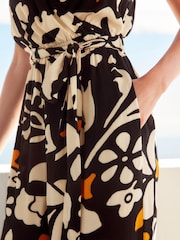 Monochrome Orange Floral V-Neck Belted Summer Wide Leg Jumpsuit - Image 4 of 6