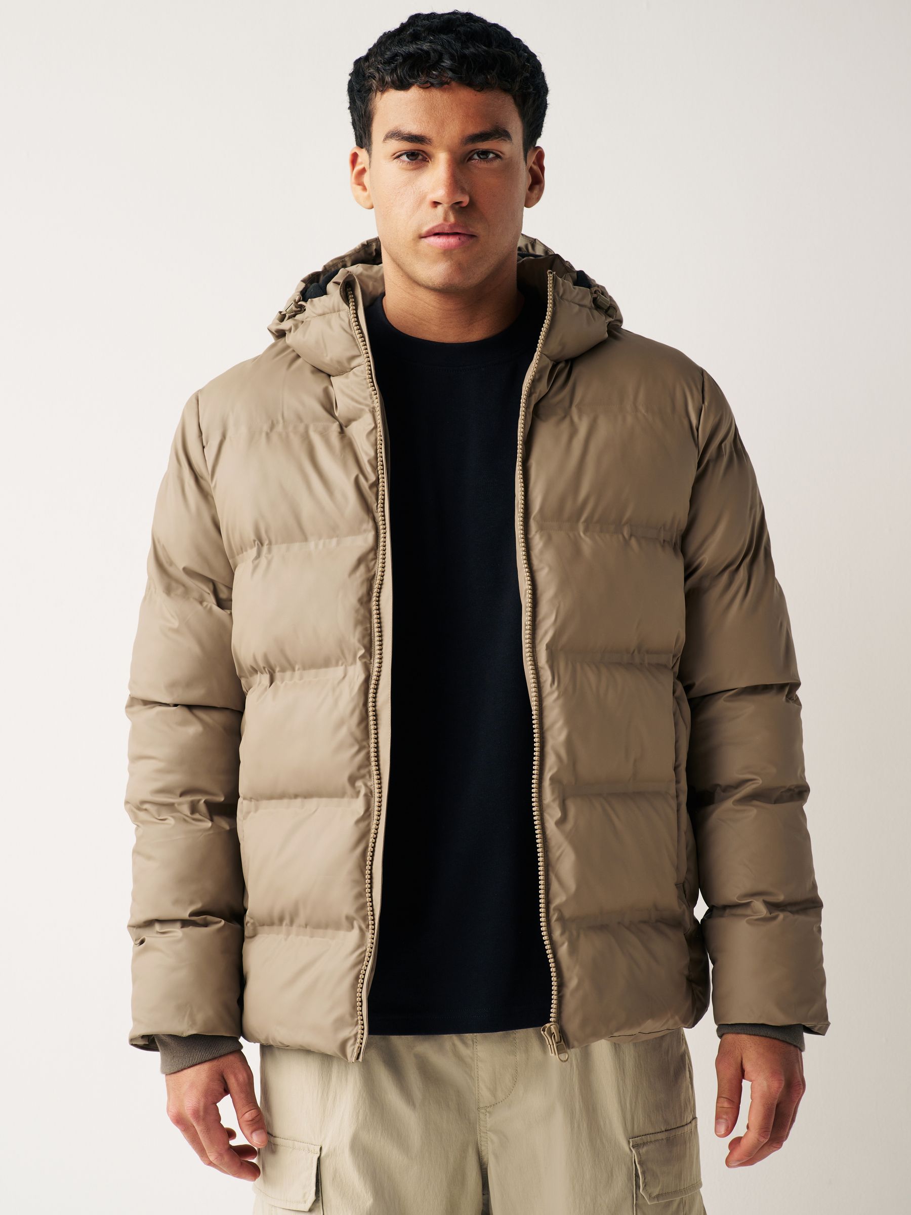 Buy Neutral Hooded Shower Resistant Rubberised Puffer Coat from Next Luxembourg