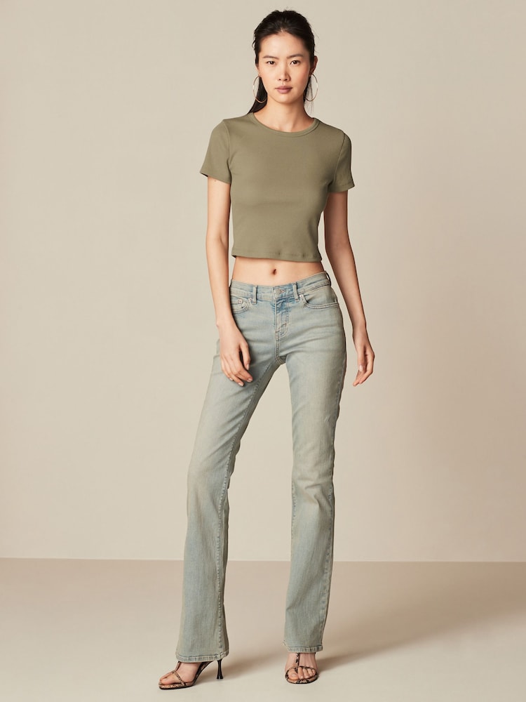 Green Tinted Low Bootcut Jeans - Image 1 of 7