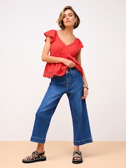 Dunkelblau - Kurz geschnittene Jeans mit weitem Bein und Verschluss mit zwei Knöpfen - Bild 1 von 7