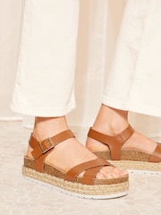 Friends Like These Brown Wide FIt Cross Strap Faux Leather Flatform Sandal - Image 1 of 5