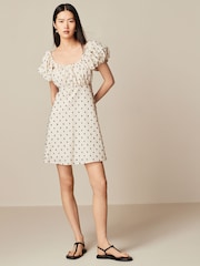 Neutral/Black Polka Dot Mini Puff Sleeve Ruched Front Dress - Image 1 of 6