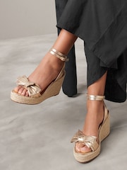 Gold Signature Leather Bow Wedges - Image 1 of 10