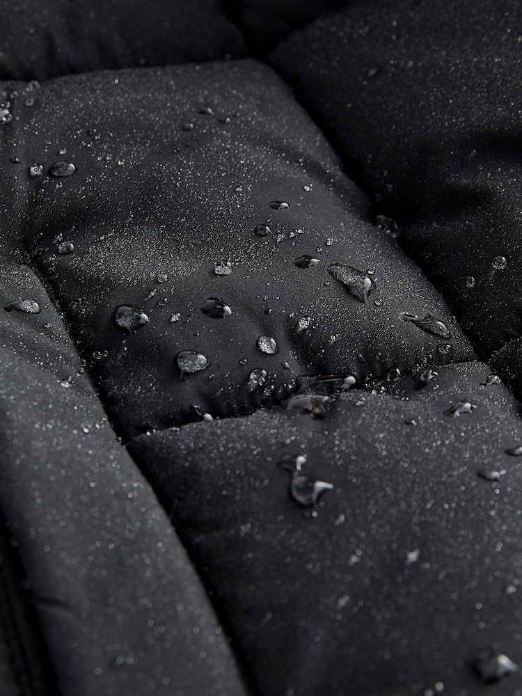 Zwart - Regenbestendige gewatteerde jas met capuchon en imitatiebontvoering (3 - 16 jr) - Image 10 of 11