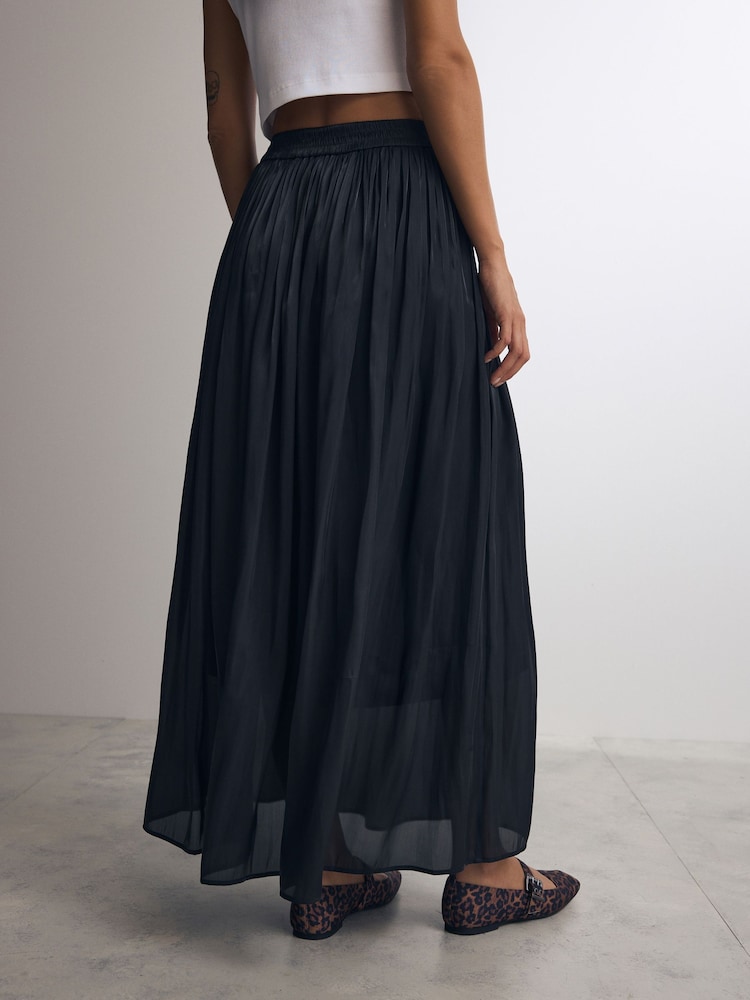 Buy Black Metallic Satin Pleated Maxi Skirt from the Next UK