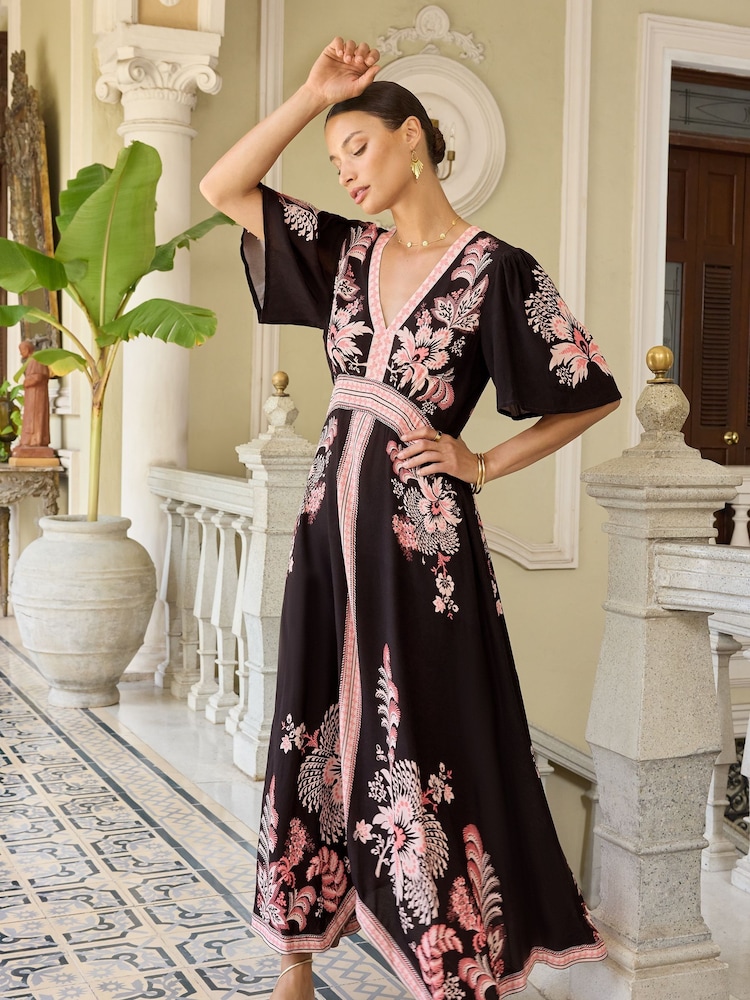 V&A | Love & Roses Pink and Black Printed V Neck Hanky Hem Midi Dress - Image 4 of 4 V&A | Love & Roses Pink and Black Printed V Neck Hanky Hem Midi Dress - Image 4 of 4