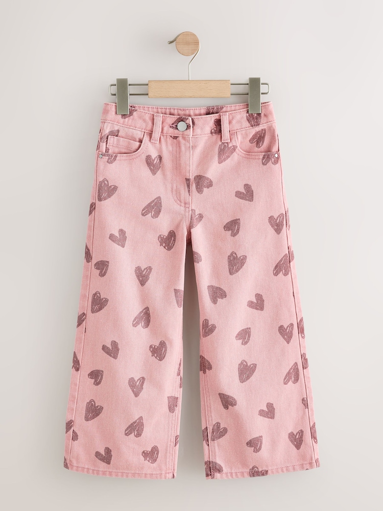 Pink Heart Print Wide Leg Jeans (3-16yrs) - Image 1 of 4 Pink Heart Print Wide Leg Jeans (3-16yrs) - Image 1 of 4
