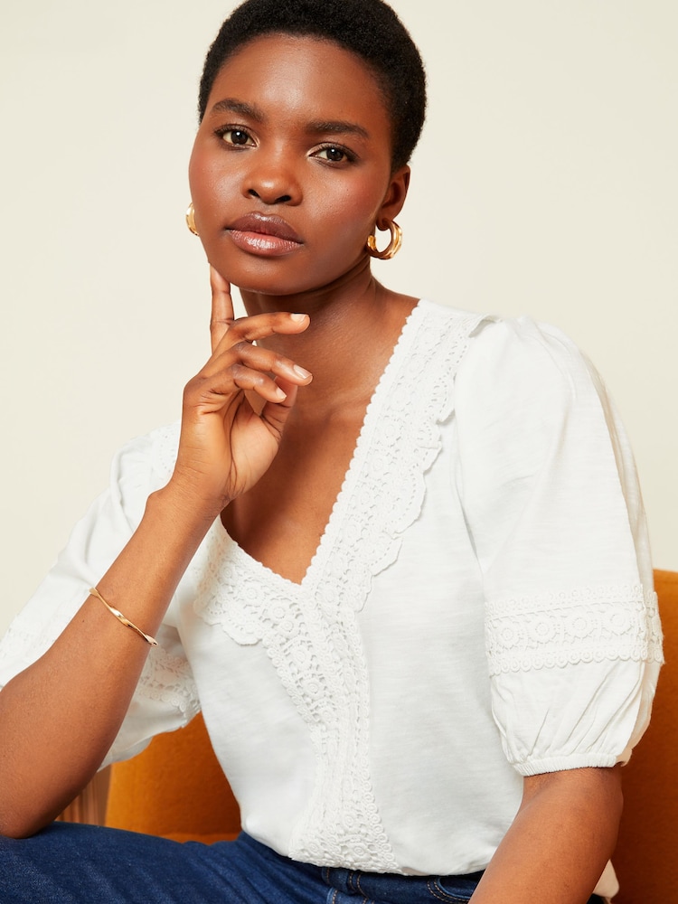 Love & Roses Ivory White Lace Ruffle Trim V Neck Puff Sleeve Jersey Top - Image 1 of 4