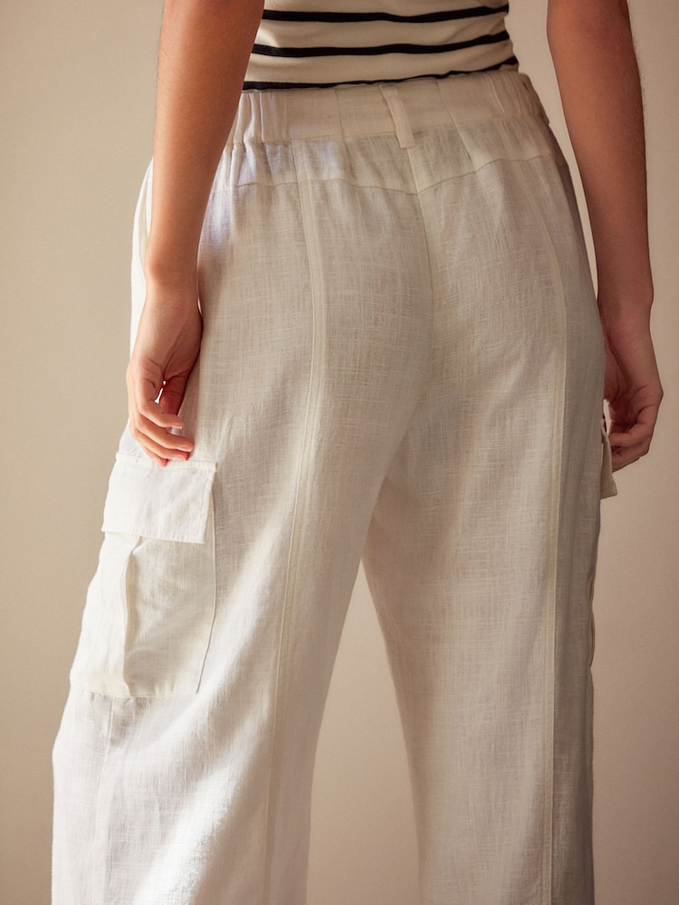 Buy White Linen Blend Cargo Wide Leg Trousers from Next Oman