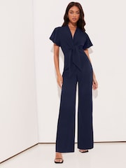 Lipsy Navy Blue Flutter Sleeve V Neck Tie Front Wide Leg Jumpsuit - Image 1 of 4
