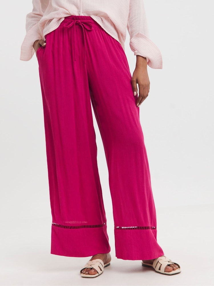 JD Williams Pink Crinkle Shirred Waist Wide Leg Trousers - Image 1 of 4 JD Williams Pink Crinkle Shirred Waist Wide Leg Trousers - Image 1 of 4