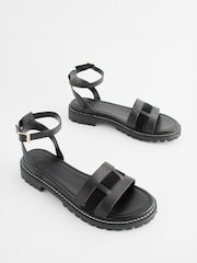 Black Extra Wide Fit Forever Comfort® Leather Cleated Sandals - Image 1 of 6