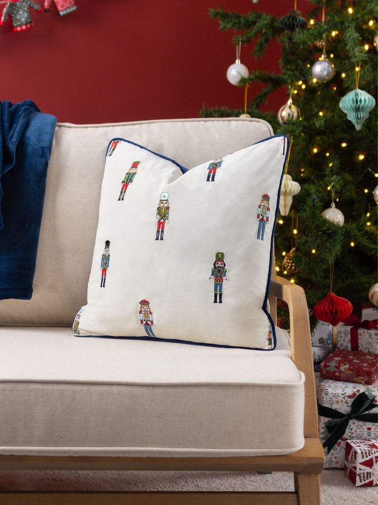 Furn Cream Classic Nutcracker Embroidered Feather Filled Christmas Cushion - Image 1 of 6 Furn Cream Classic Nutcracker Embroidered Feather Filled Christmas Cushion - Image 1 of 6