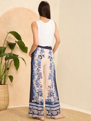 V&A | Love & Roses Blue Petite Placement Print Wide Leg Trousers - Image 3 of 4