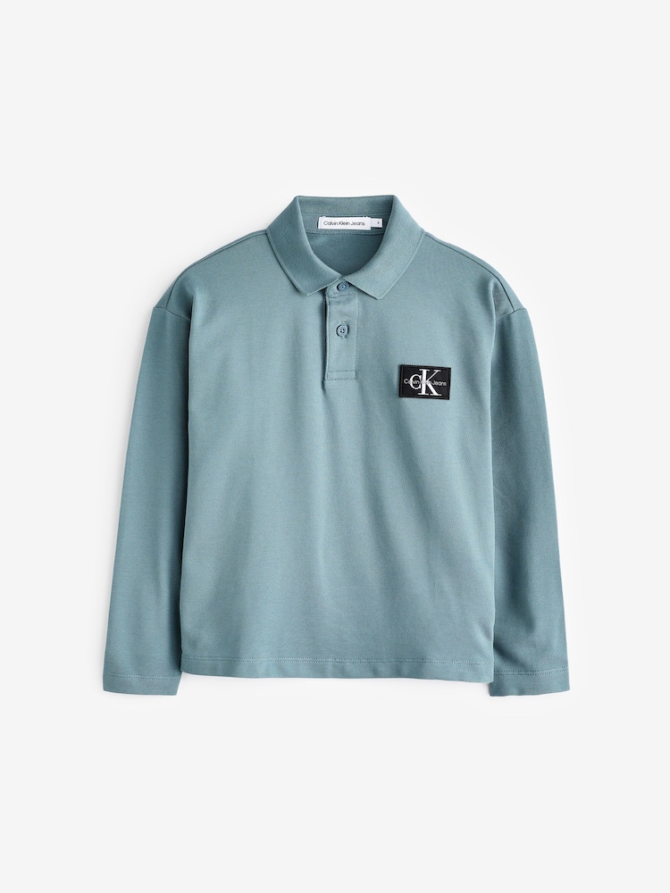 Calvin Klein Jeans Blue Pique Long Sleeve Polo Shirt - Image 1 of 3 Calvin Klein Jeans Blue Pique Long Sleeve Polo Shirt - Image 1 of 3