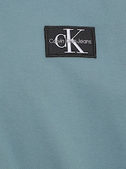 Синяя рубашка поло из пике с длинными рукавами Calvin Klein Jeans - Изображение 3 из 3
