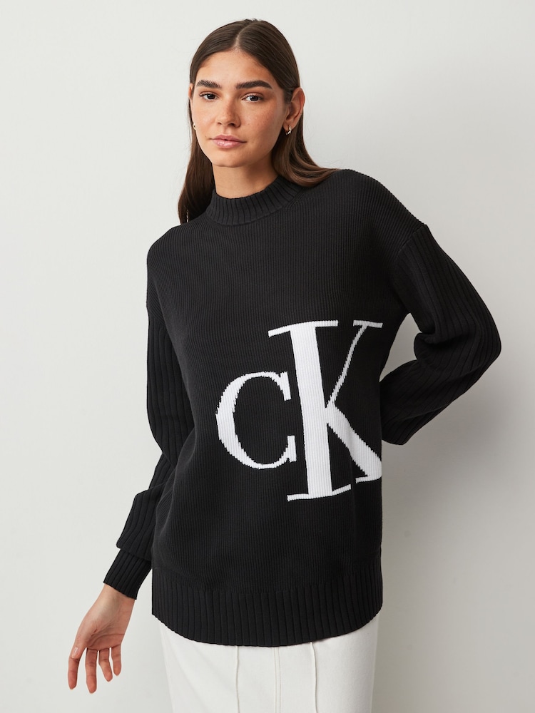 Calvin Klein Jeans Black Blown Up Logo Sweater - Image 1 of 4 Calvin Klein Jeans Black Blown Up Logo Sweater - Image 1 of 4