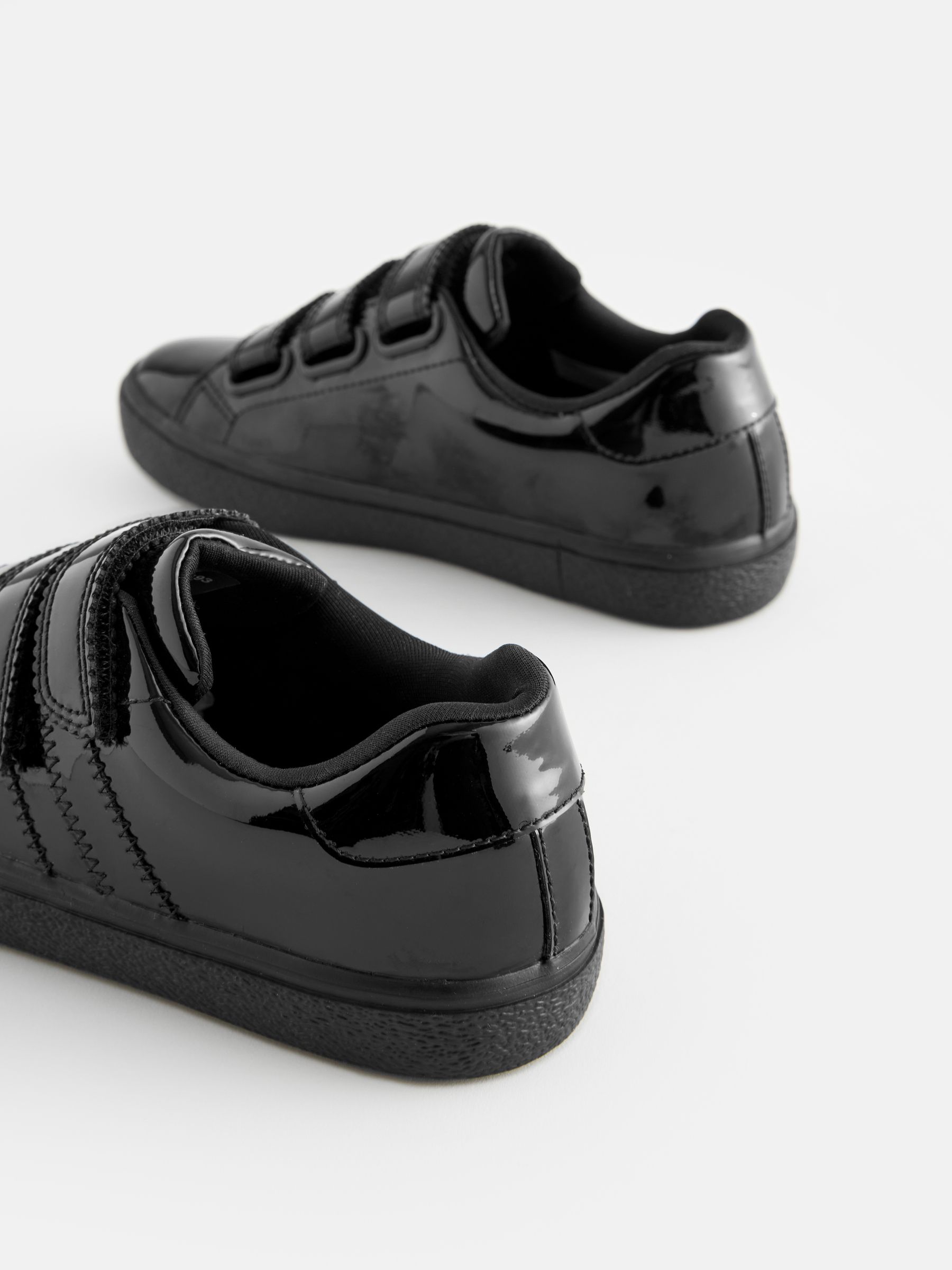 girls black leather trainers