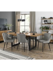 Bentley Designs Rustic Oak Black Indus Extending 6-8 Seater Dining Table and Grey Chairs Set - Image 1 of 6