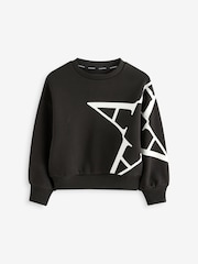 Schwarz/Stern - smALLSAINTS Cygni übergroßes Sweatshirt für Mädchen mit Grafik aus 100 % Baumwolle - Bild 6 von 9