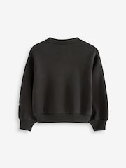 Schwarz/Stern - smALLSAINTS Cygni übergroßes Sweatshirt für Mädchen mit Grafik aus 100 % Baumwolle - Bild 7 von 9