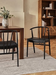 Set of 2 Distressed Faux Leather Black Stockholm Black Leg Dining Chairs - Image 1 of 10