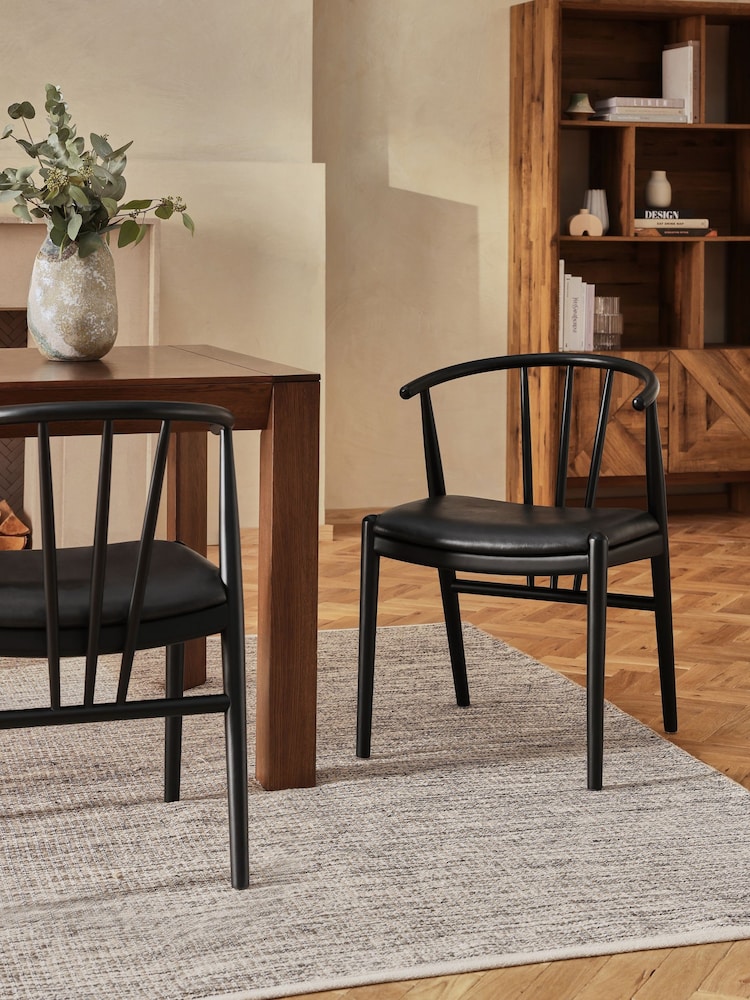 Set of 2 Distressed Faux Leather Black Stockholm Black Leg Dining Chairs - Image 1 of 10