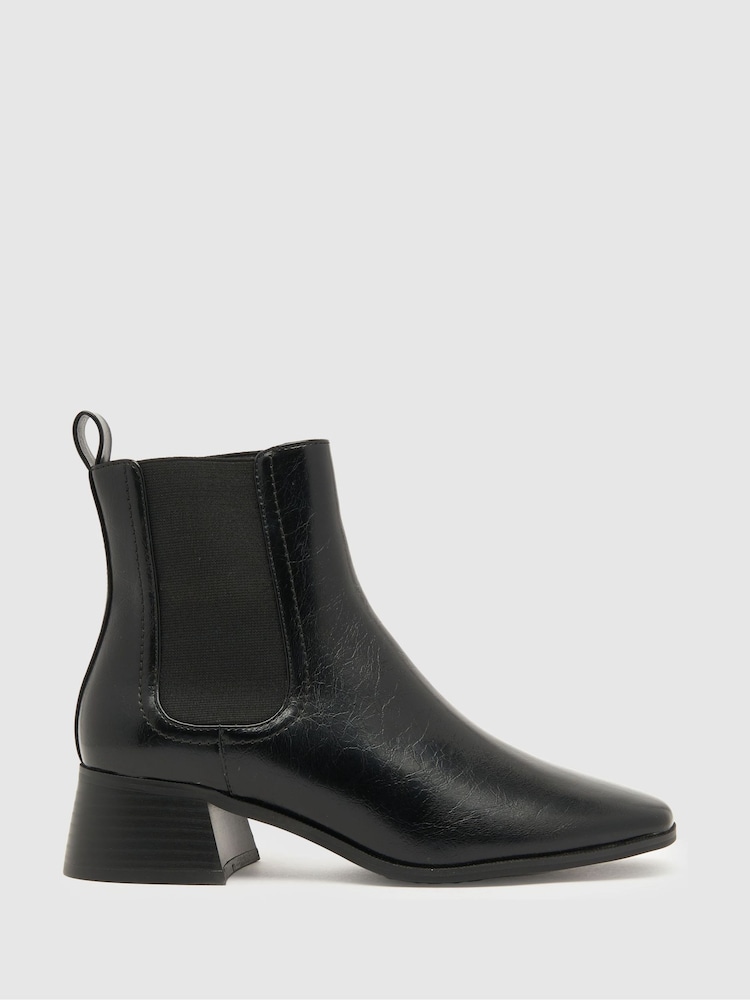 Schuh Brooke Block Heel Chelsea Black Boots - Image 1 of 4 Schuh Brooke Block Heel Chelsea Black Boots - Image 1 of 4