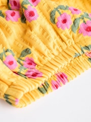 Blumenmuster, Ocker/Gelb - 2-teiliges Baby-Set mit Schößchenoberteil und Höschen aus 100 % Baumwolle - Bild 6 von 8