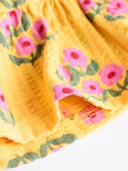 Blumenmuster, Ocker/Gelb - 2-teiliges Baby-Set mit Schößchenoberteil und Höschen aus 100 % Baumwolle - Bild 8 von 8