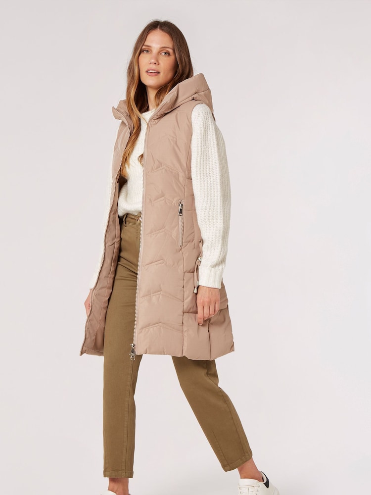 Apricot Natural Eyelet Detail Puffer Hood Gilet - Image 1 of 4 Apricot Natural Eyelet Detail Puffer Hood Gilet - Image 1 of 4