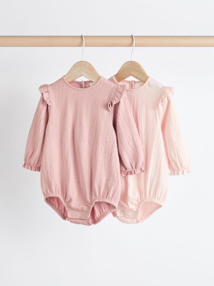 Rosa/Creme - Langärmelige Crinkle-Bodysuits für Babys im 2er-Pack - Bild 1 von 9 Rosa/Creme - Langärmelige Crinkle-Bodysuits für Babys im 2er-Pack - Bild 1 von 9